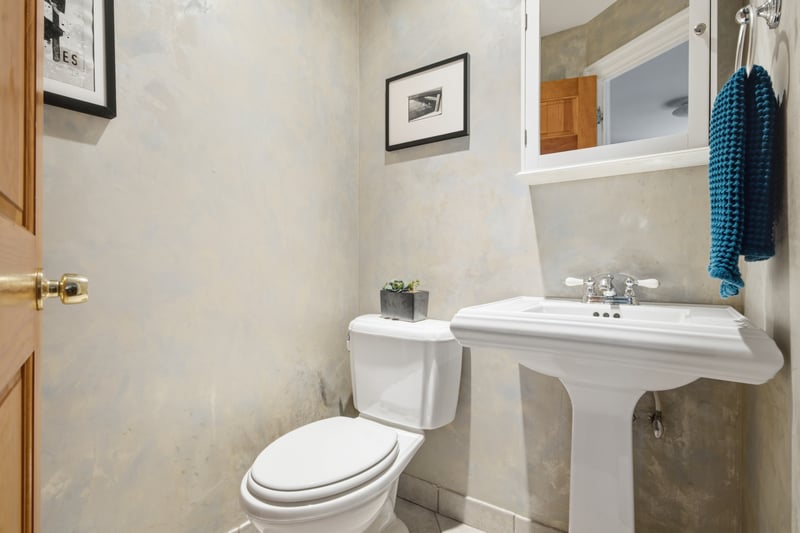 Bathroom featuring toilet and tile patterned floors