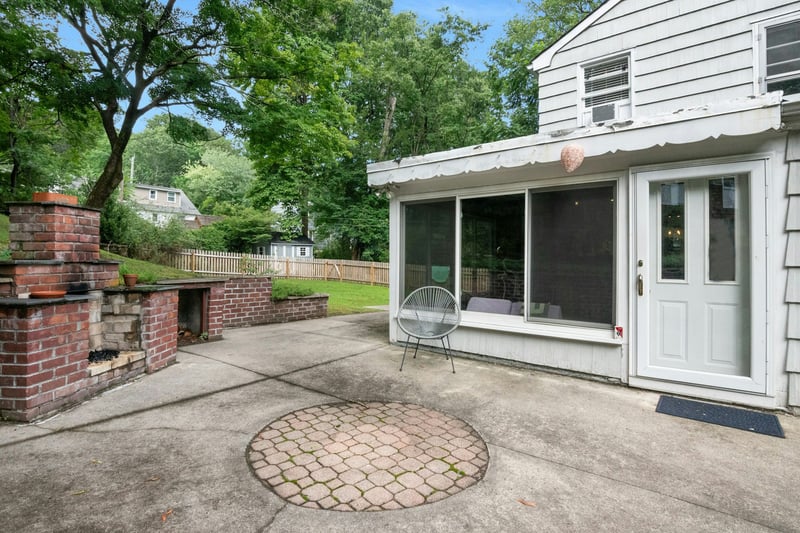 View of patio / terrace with a sunroom