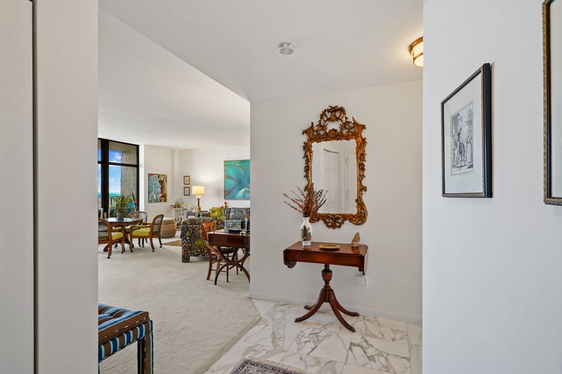 Foyer features beautiful polished marble floor.