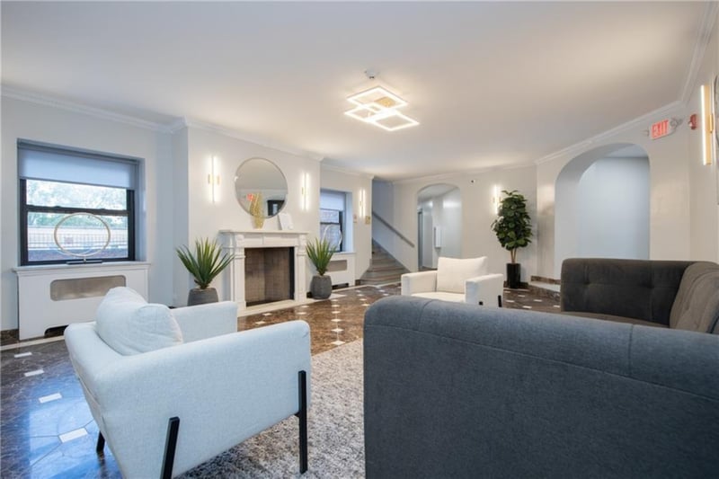 Living room featuring ornamental molding