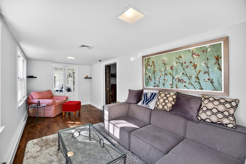 Den area featuring plenty of natural light