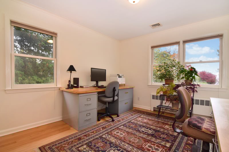 One of 3 bedrooms on main living level is currently being used as an office with western views