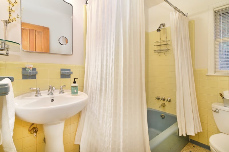 Hall bath is one of 3 full baths