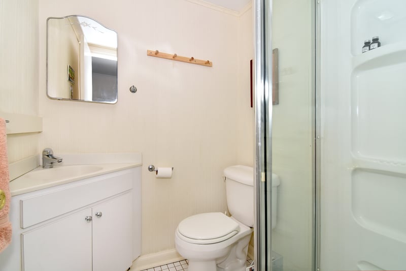 En suite bath found in lower level 4th bedroom located on the lower level