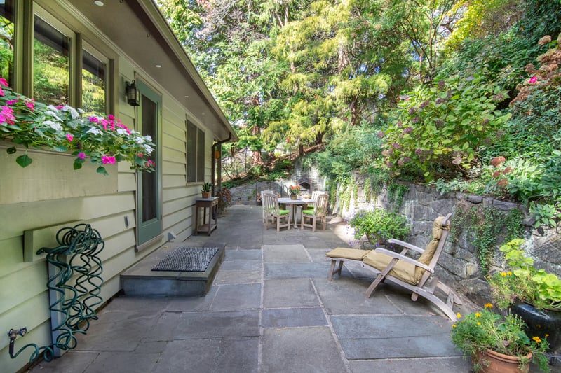 Total privacy is yours on the rear slate patio.