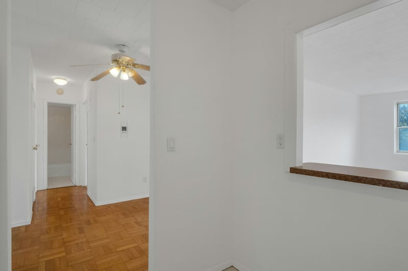 Open layout with hardwood floors throughout