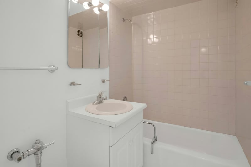Full bath featuring vanity and tub / shower combination