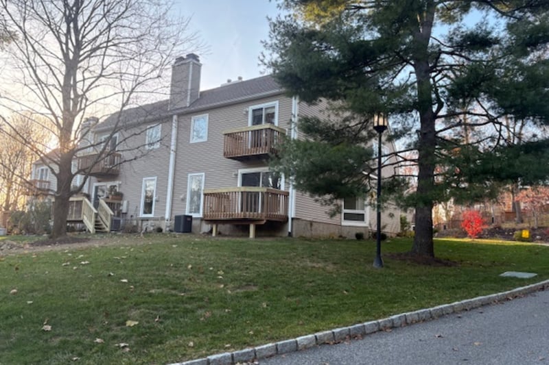Rear view of house showing plenty of lawn space