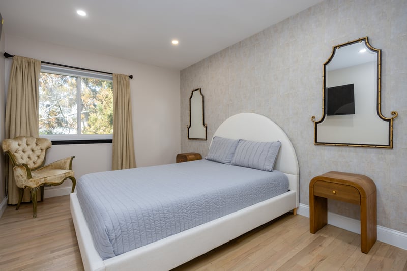 Bedroom with light wood-type flooring and recessed lighting