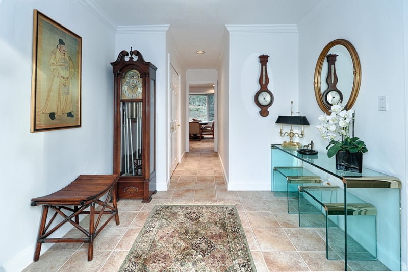 Welcoming foyer and front hall with two closets which leads to the kitchen.