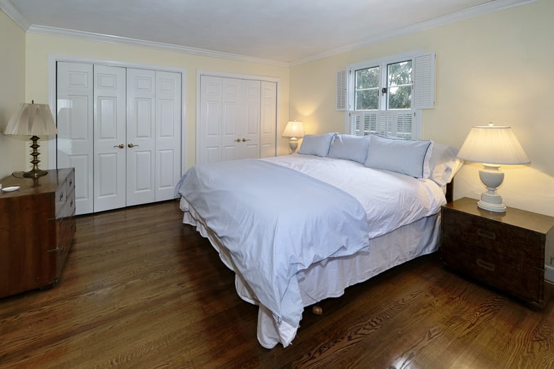 Primary bedroom suite features multiple closets including a walk-in.