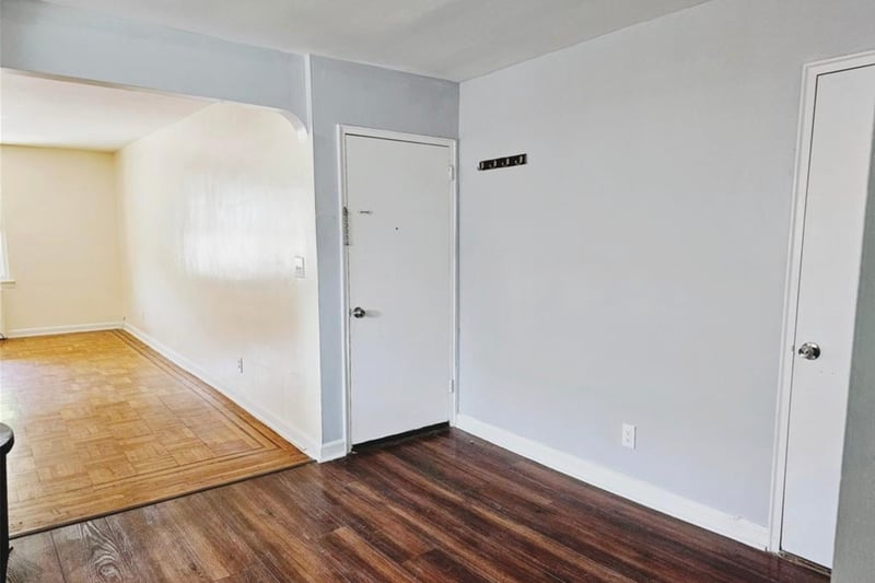 Entry, with views into the living room.
