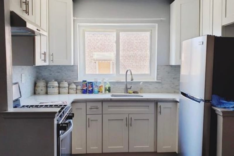 Updated kitchen with wood floors.