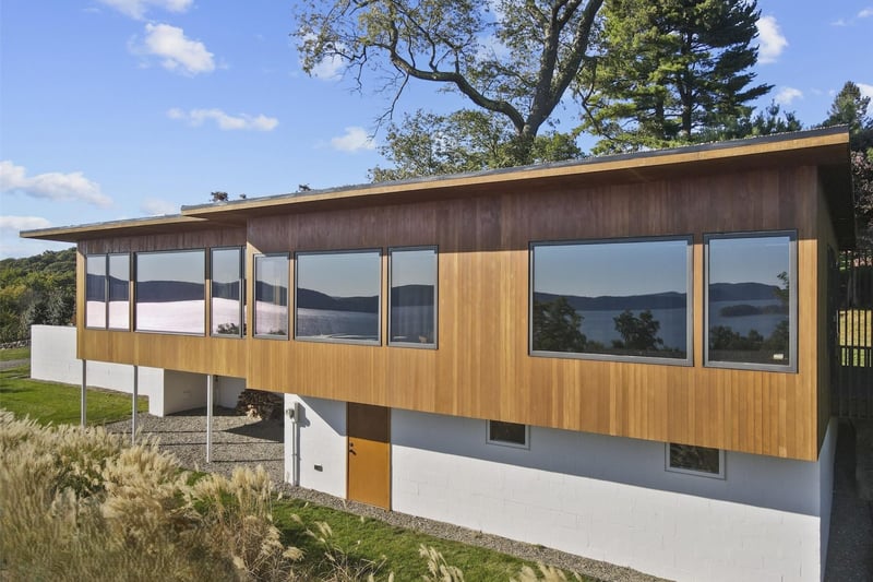 Main House with Windows Reflecting the Hudson River View