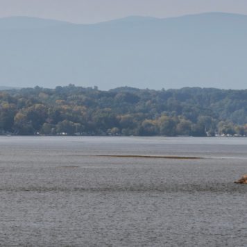Esopus Meadows Lighthouse on the Hudson River, Esopus, NY, in early fall - stock photo