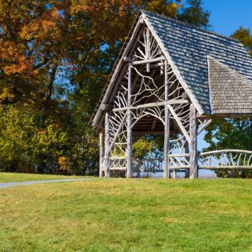 Landscape with Overlook Pavilion (Wooden Gazebo), Gravel Footpath, Trees in Autumn Colors (Foliage) and Vivid Blue Sky, Poets' Walk Park, Red Hook, Hudson Valley