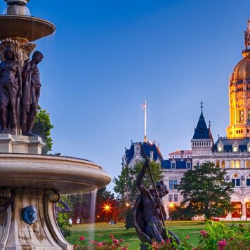 The Connecticut State Capitol building with the Corning Fountain in the foreground. The fountain was dedicated in 1899.