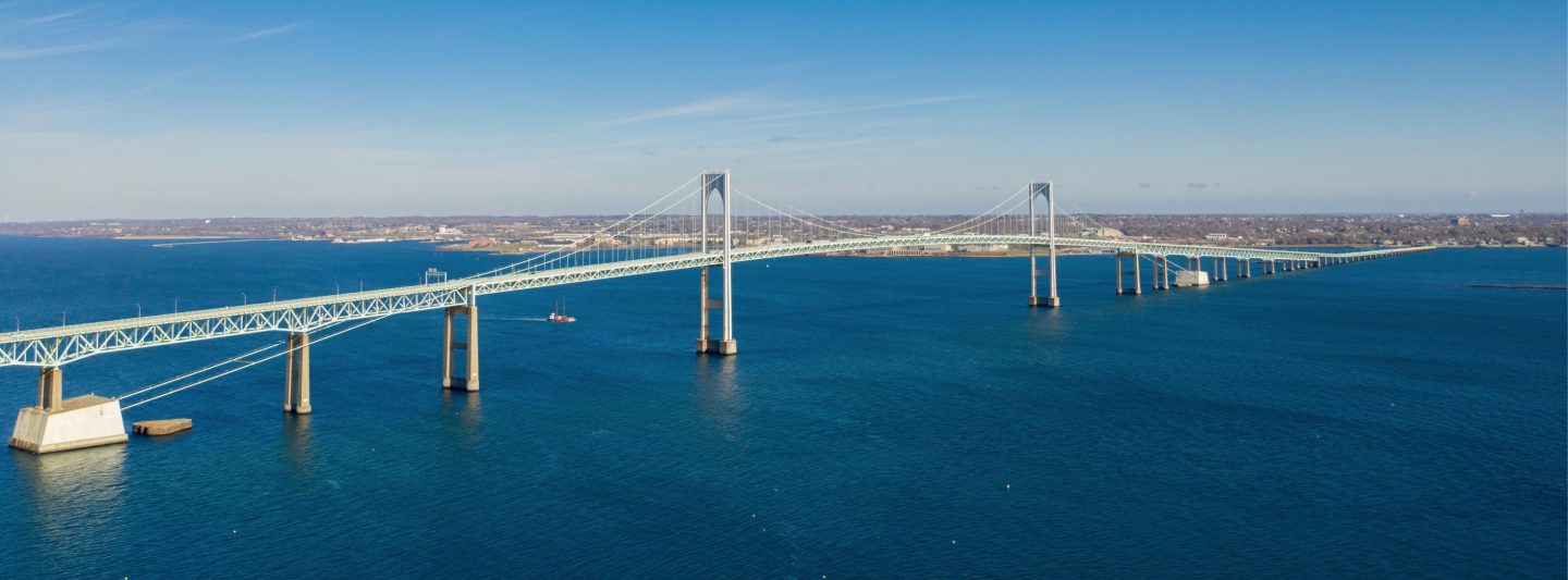 Claiborne Pell Newport Bridge on Narragansett Bay and town of Jamestown aerial view in summer, Jamestown on Conanicut Island, Rhode Island RI, USA.