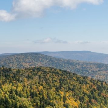A bright white cloud hovering over the Catskill Mountains near Phoenicia, NY